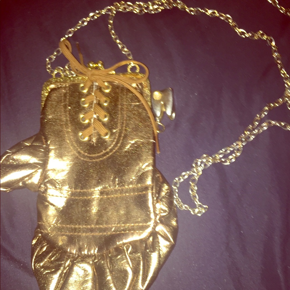 Gold boxing glove clutch